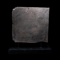 An Egyptian Stone Relief Fragment of a Female Pharaoh or Goddess