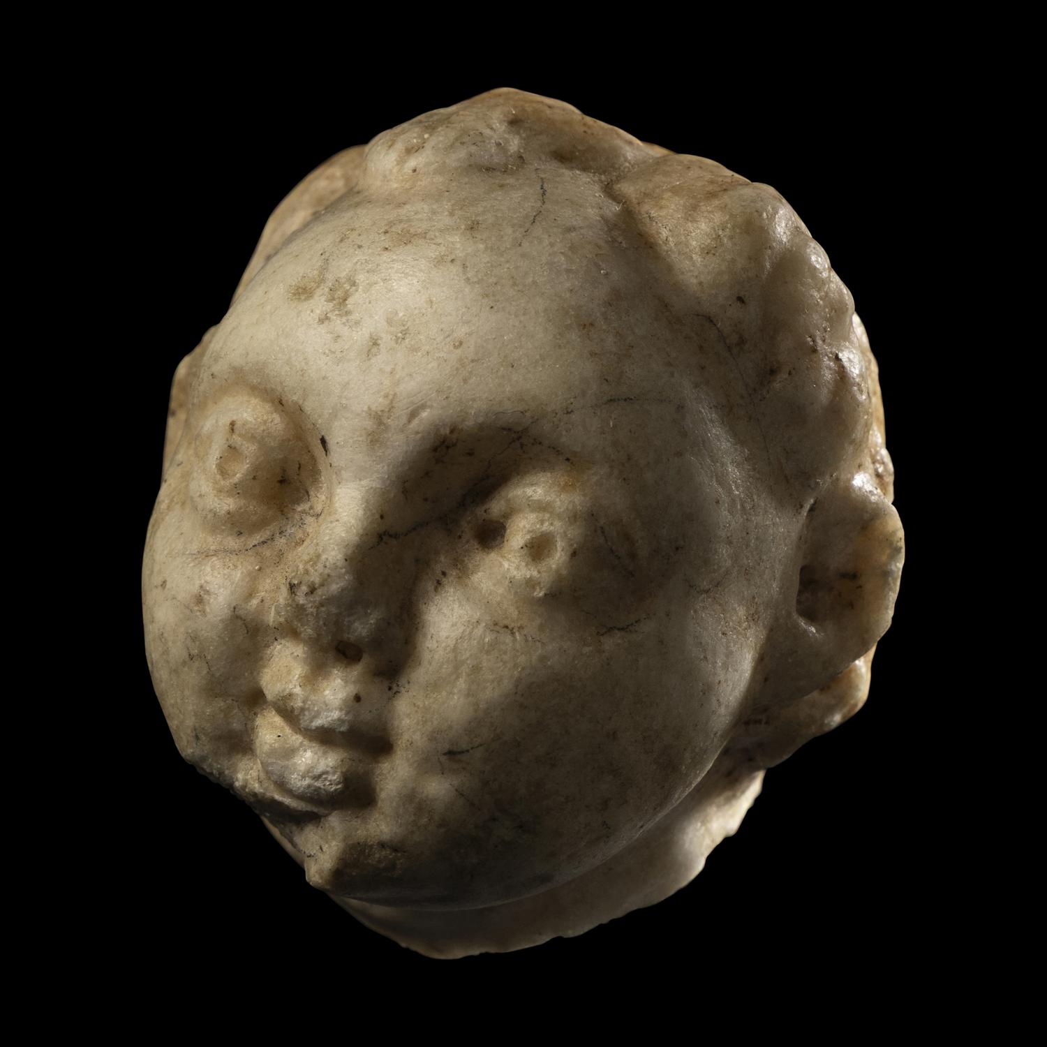 A Roman Marble Head of an Infant