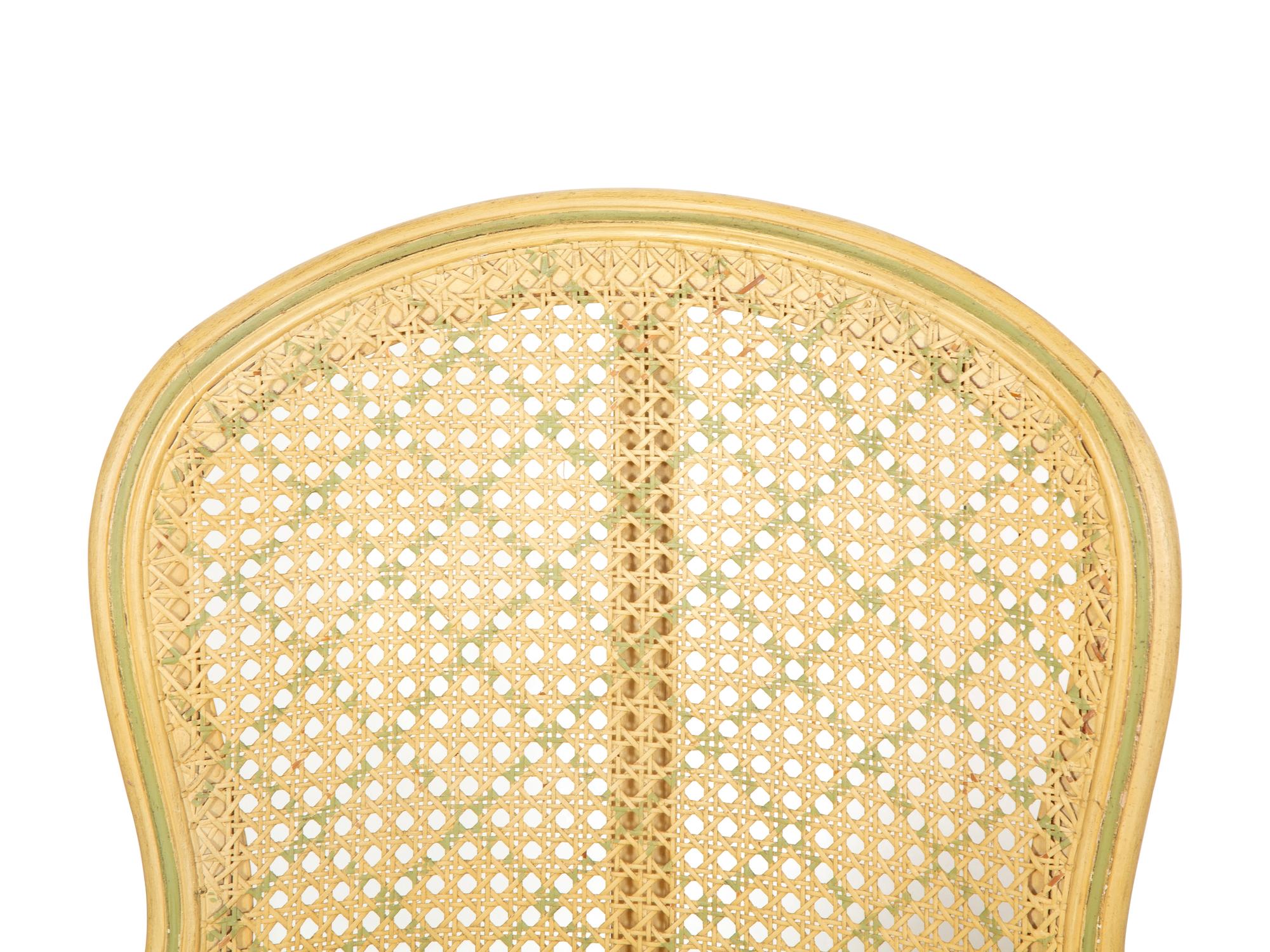 A Pair of Louis XVI Style Painted Caned Back Side Chairs with a Marble Top Gueridon