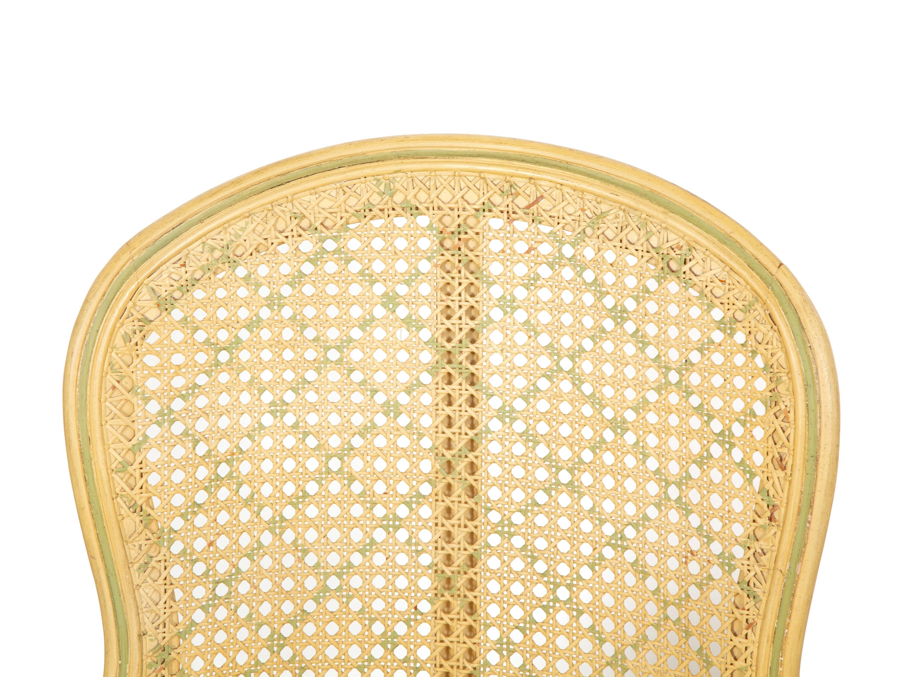 A Pair of Louis XVI Style Painted Caned Back Side Chairs with a Marble Top Gueridon