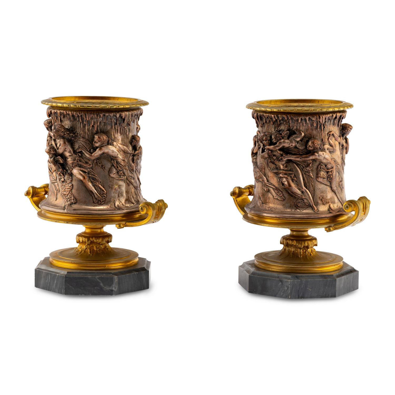 A Pair of French Gilt and Silvered Bronze Urns