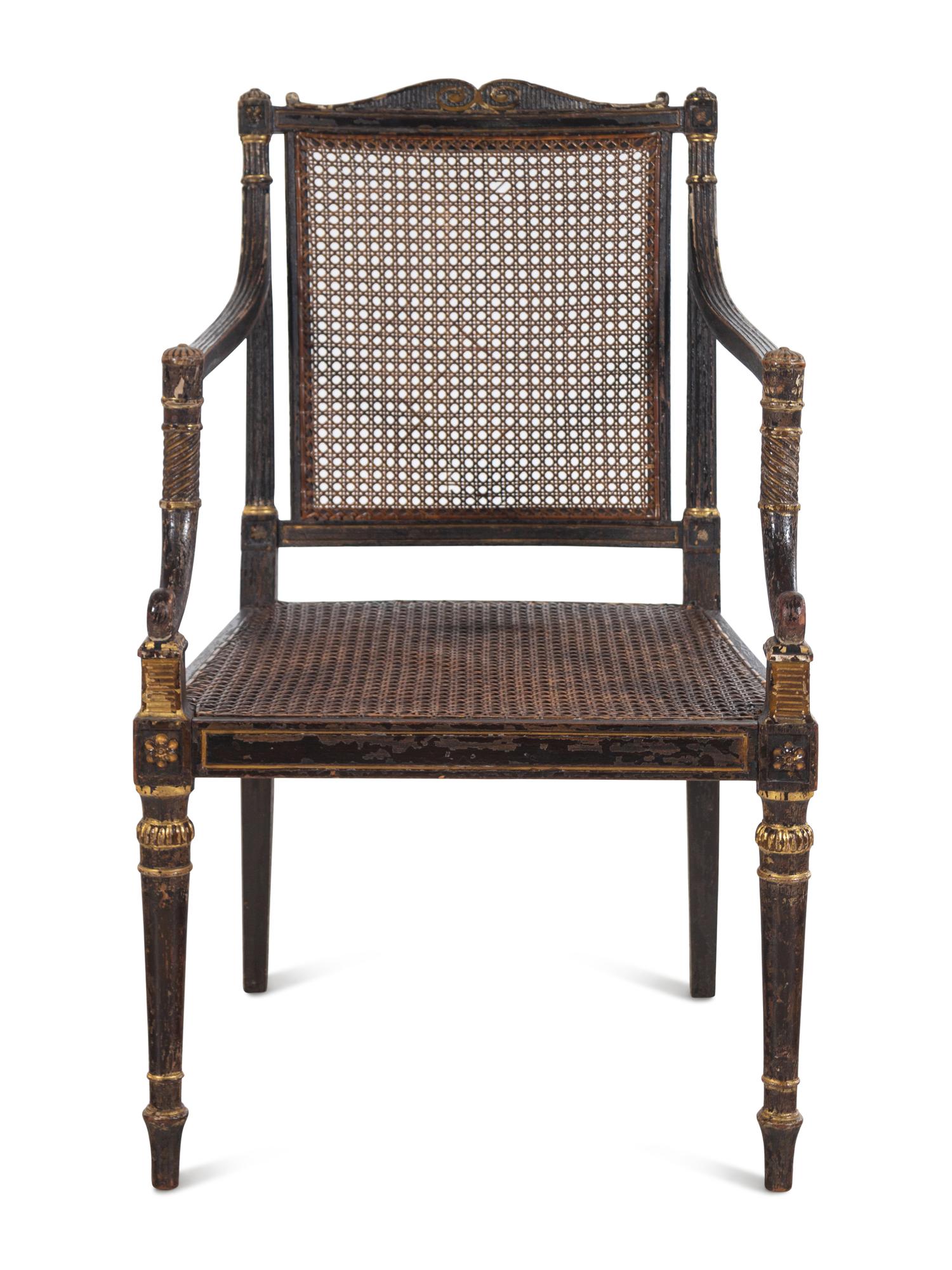 A George III Painted and Parcel-Gilt Caned Armchair