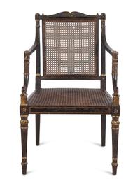 A George III Painted and Parcel-Gilt Caned Armchair