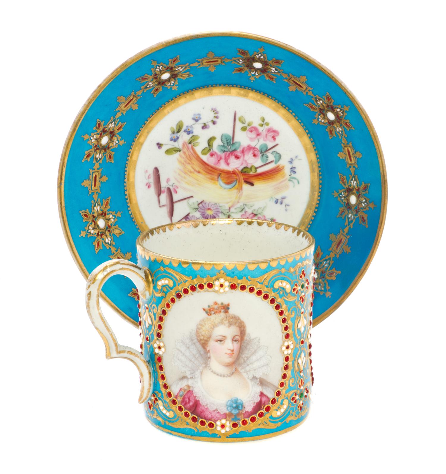 A Sevres Porcelain Jeweled Cup and Saucer, Diameter of saucer 5 1/2 inches.