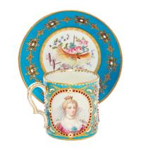 A Sevres Porcelain Jeweled Cup and Saucer, Diameter of saucer 5 1/2 inches.