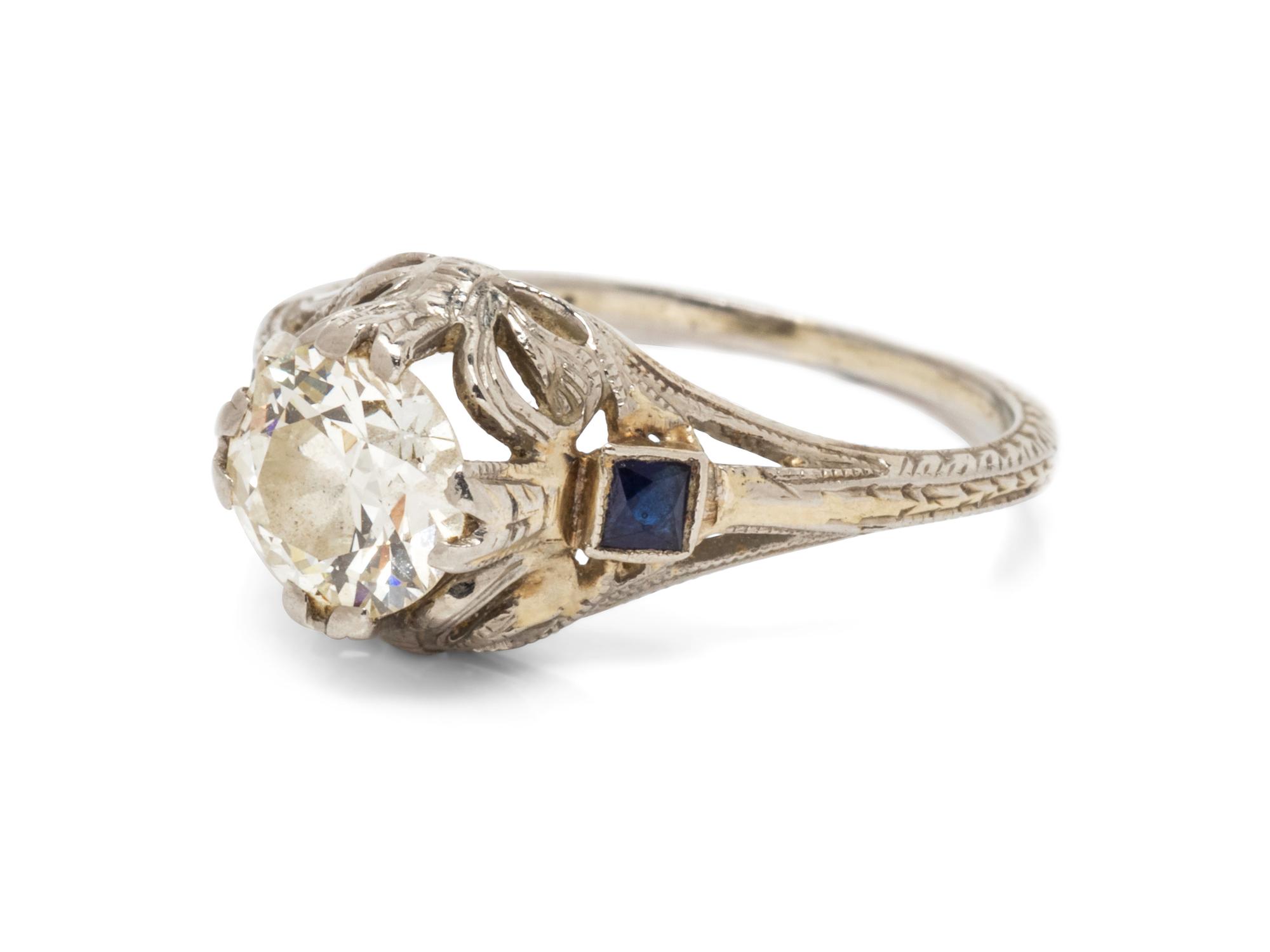 An 18 Karat White Gold, Diamond and Synthetic Sapphire Ring,