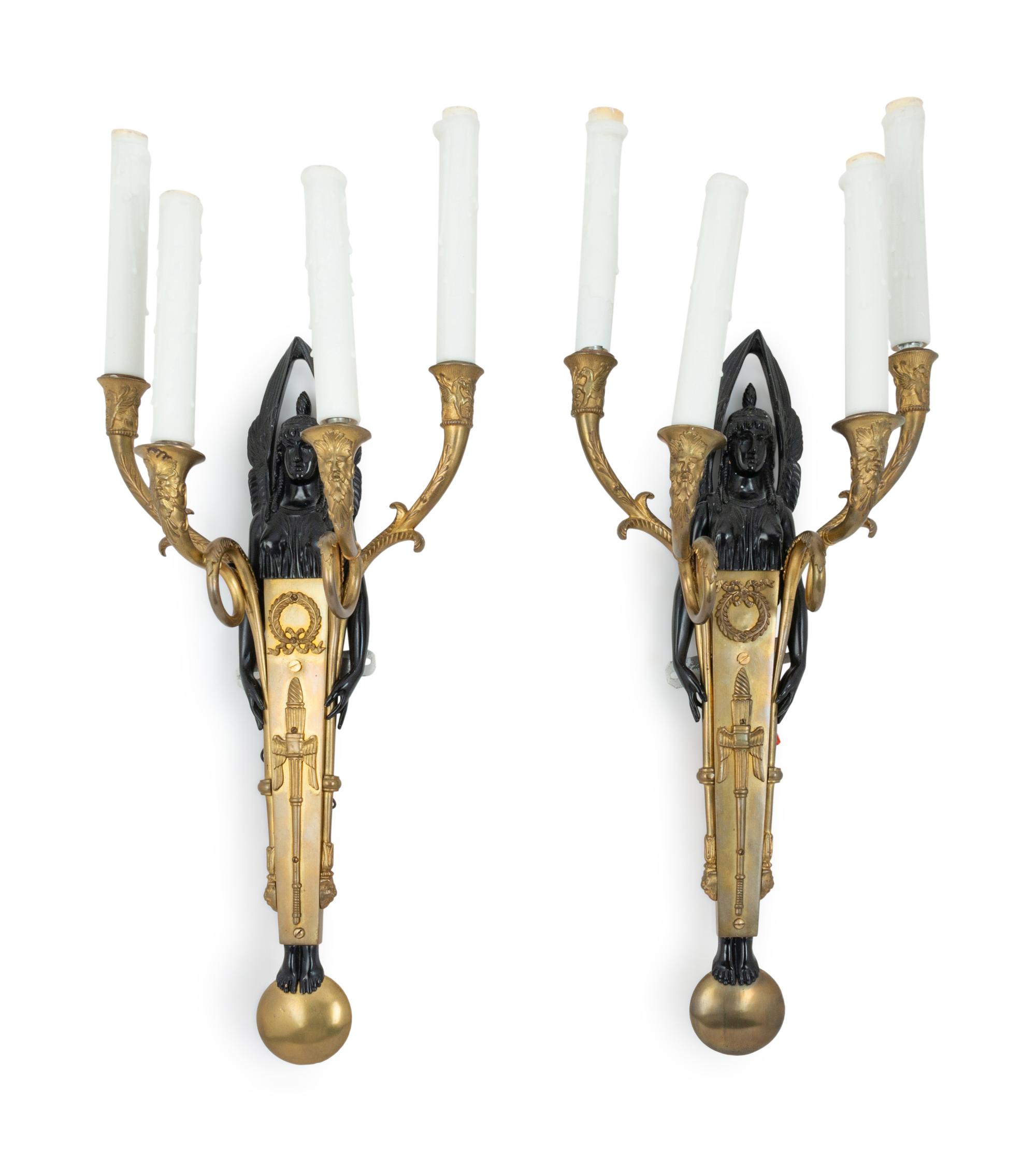 A Pair of Empire Style Gilt and Patinated Bronze Four-Light Sconces