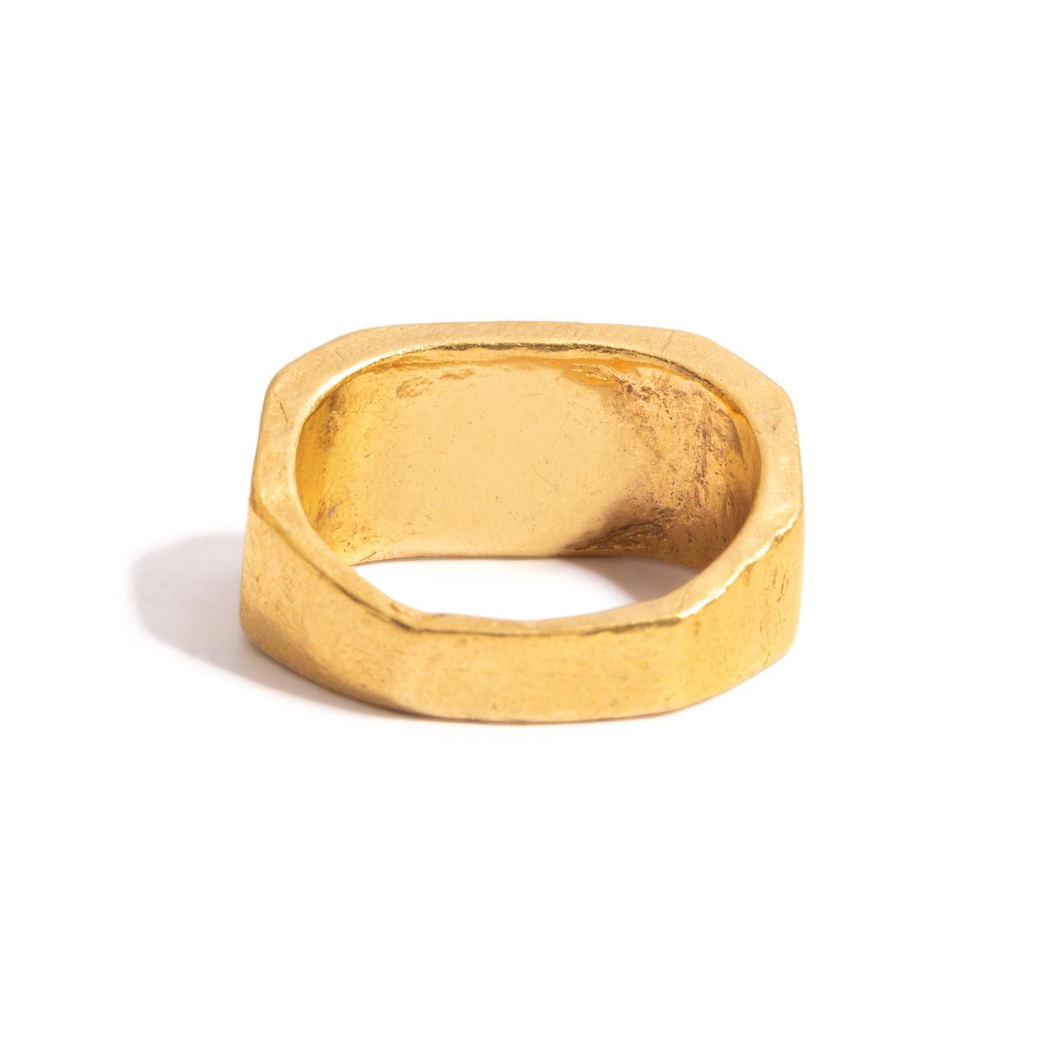 A Roman Gold and Banded Carnelian Cabochon Finger Ring