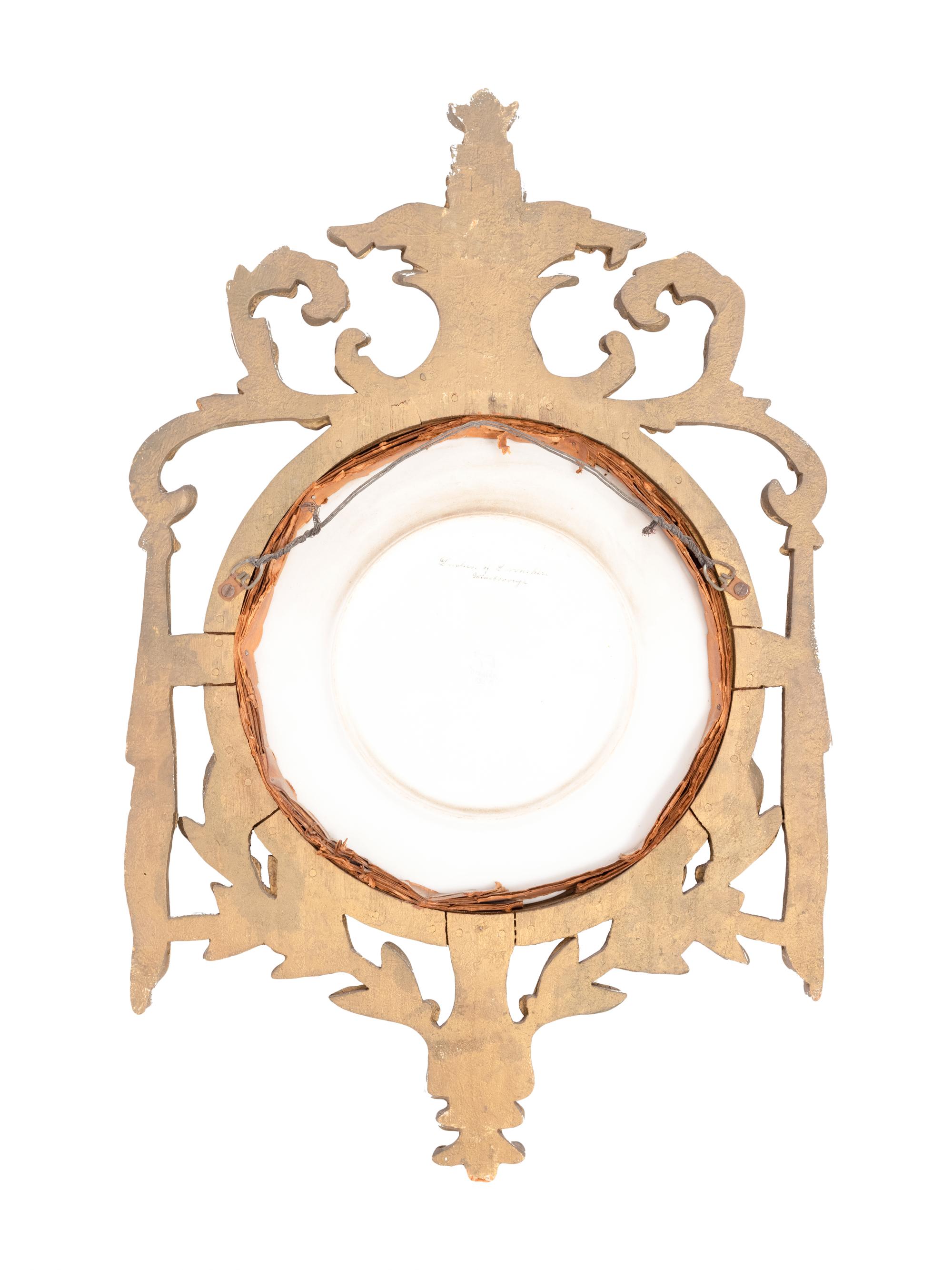 A German Porcelain Cabinet Plate in a Pierce Carved Giltwood Frame after Thomas Gainsborough (1727-1788)