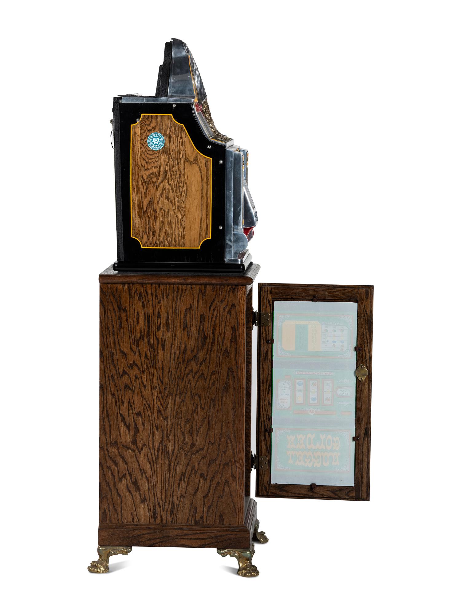 A 5 Cent Rol-A-Top Twin Jackpot Slot Machine on Reverse Printed Glass Inset Golden Nugget Stand