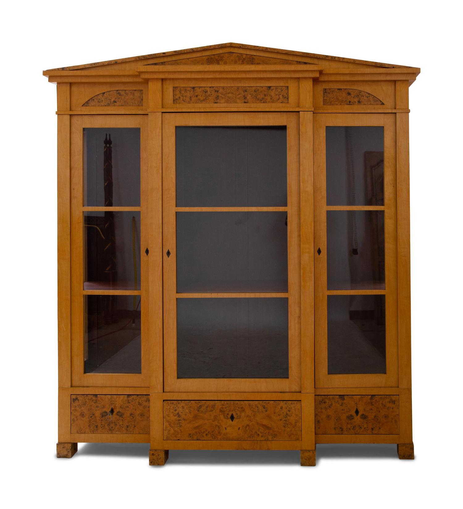 A German Neoclassical Birch Breakfront Bookcase