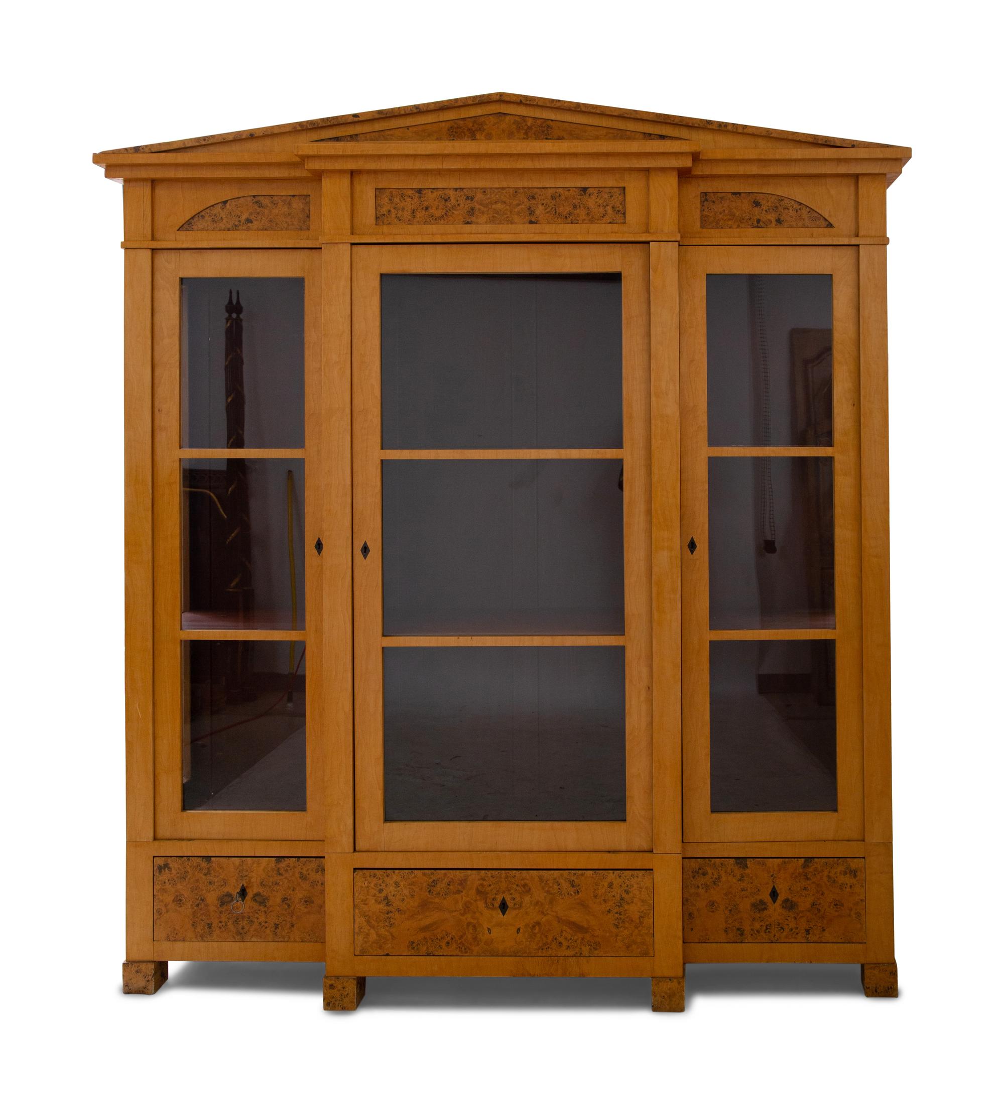 A German Neoclassical Birch Breakfront Bookcase