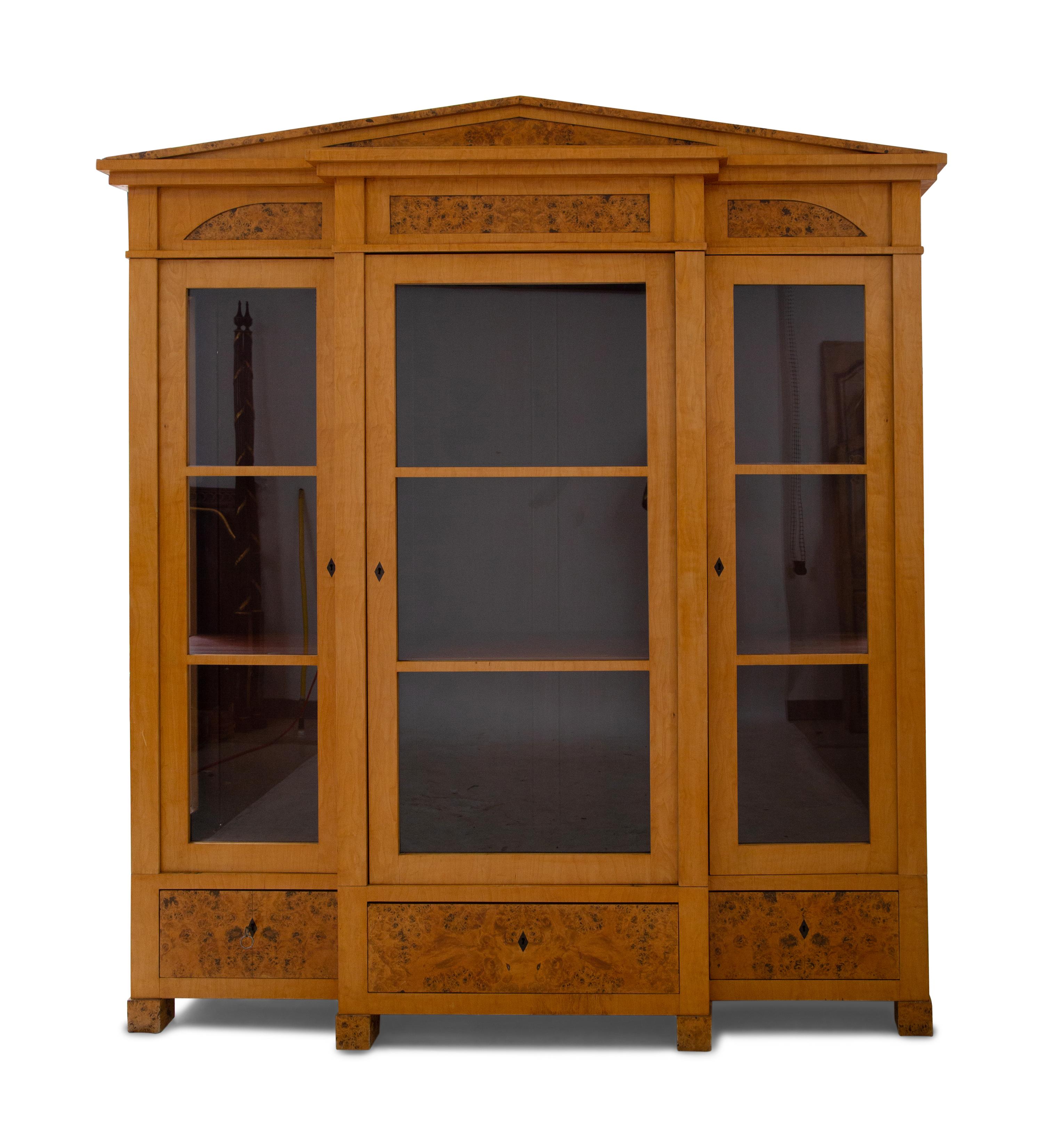 A German Neoclassical Birch Breakfront Bookcase