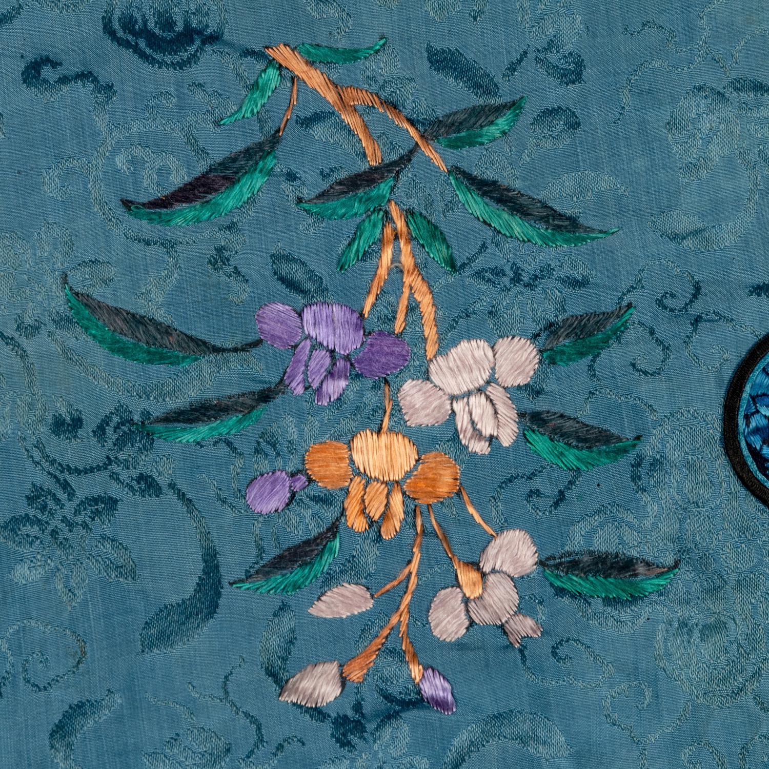 Two Chinese Embroidered Silk Lady's Robes, 19th Century 清晚期 藍地織錦綉花女上衣兩件
