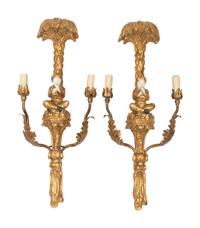 A Pair of Italian Giltwood and Tole Figural Two-Light Sconces