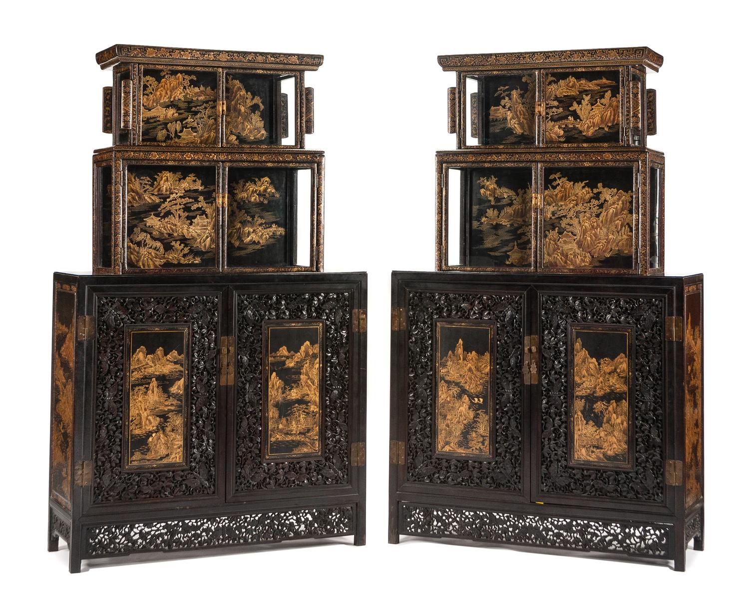 A Pair of Chinese Carved and Lacquered Cabinets Height 81 x width 51 x depth 18 1/2 inches.