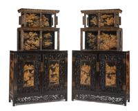 A Pair of Chinese Carved and Lacquered Cabinets Height 81 x width 51 x depth 18 1/2 inches.