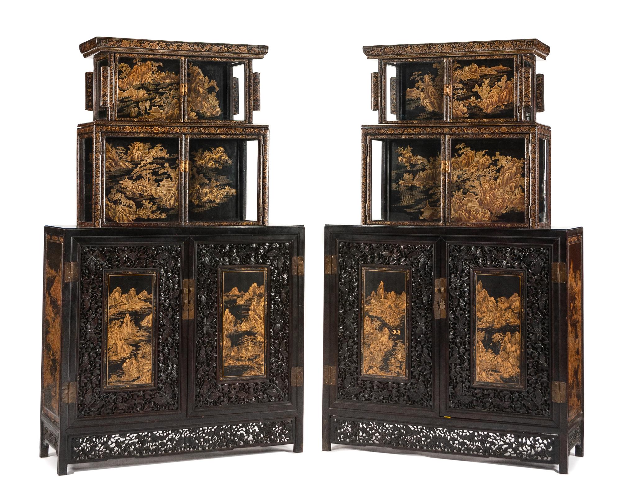 A Pair of Chinese Carved and Lacquered Cabinets Height 81 x width 51 x depth 18 1/2 inches.