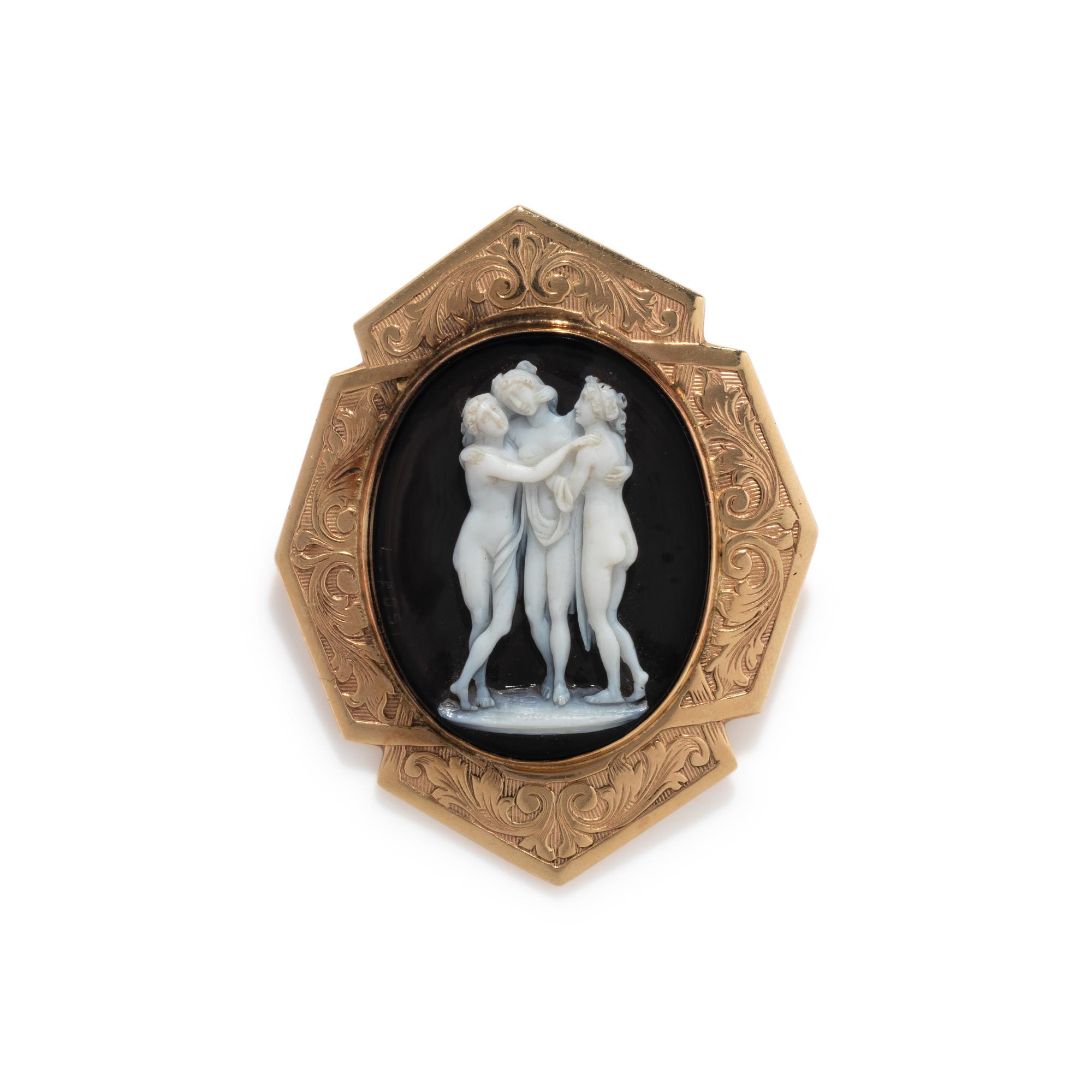 A Victorian Gold and Onyx Cameo Brooch with the Three Graces — The reverse inscribed 'Luigi Rosi Roma Piazza De Spagna 86'