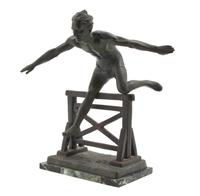 A French Cast Metal Figure of a Hurdler, after Chiparus, Height 17 3/4 inches.