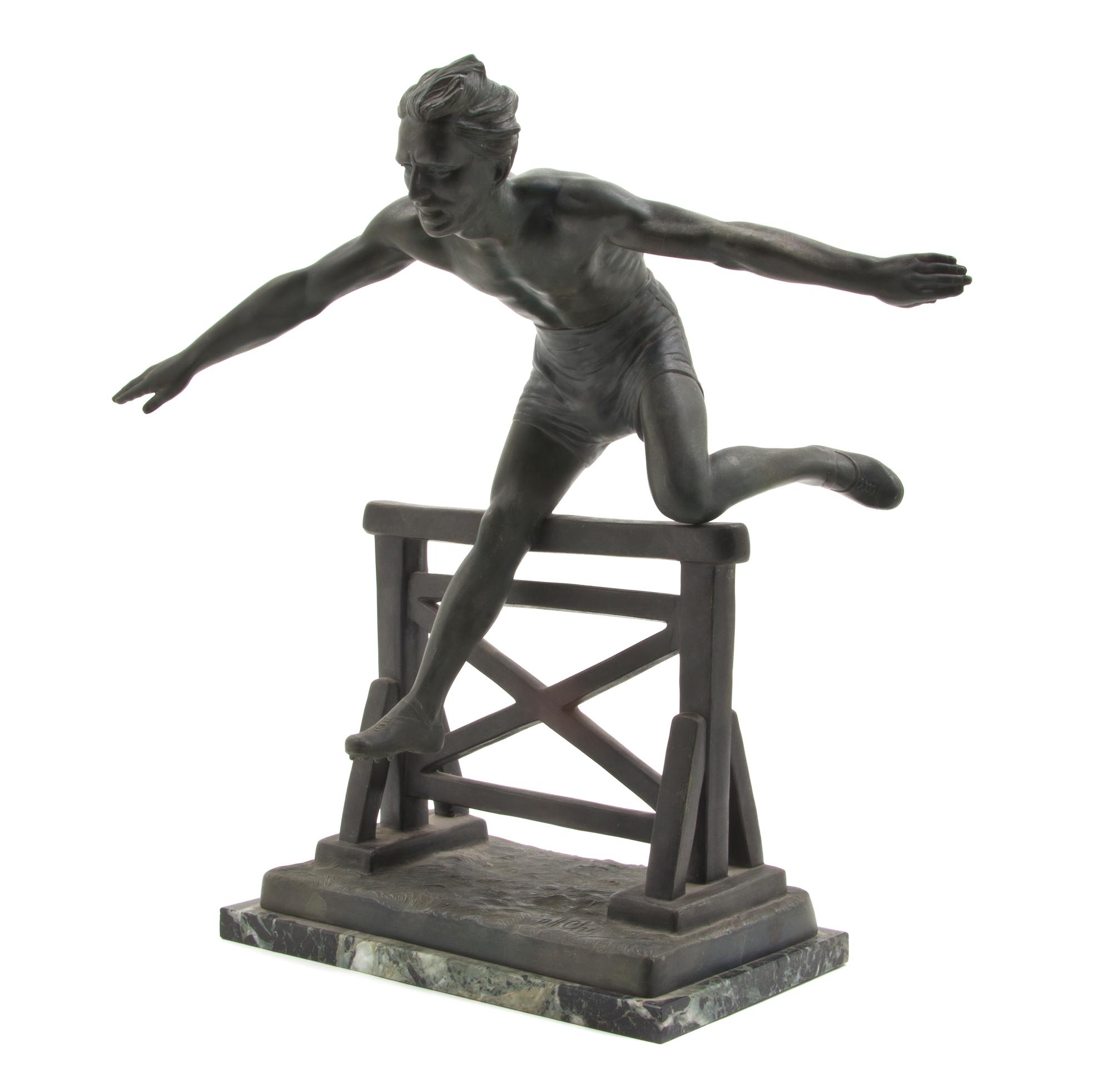 A French Cast Metal Figure of a Hurdler, after Chiparus, Height 17 3/4 inches.