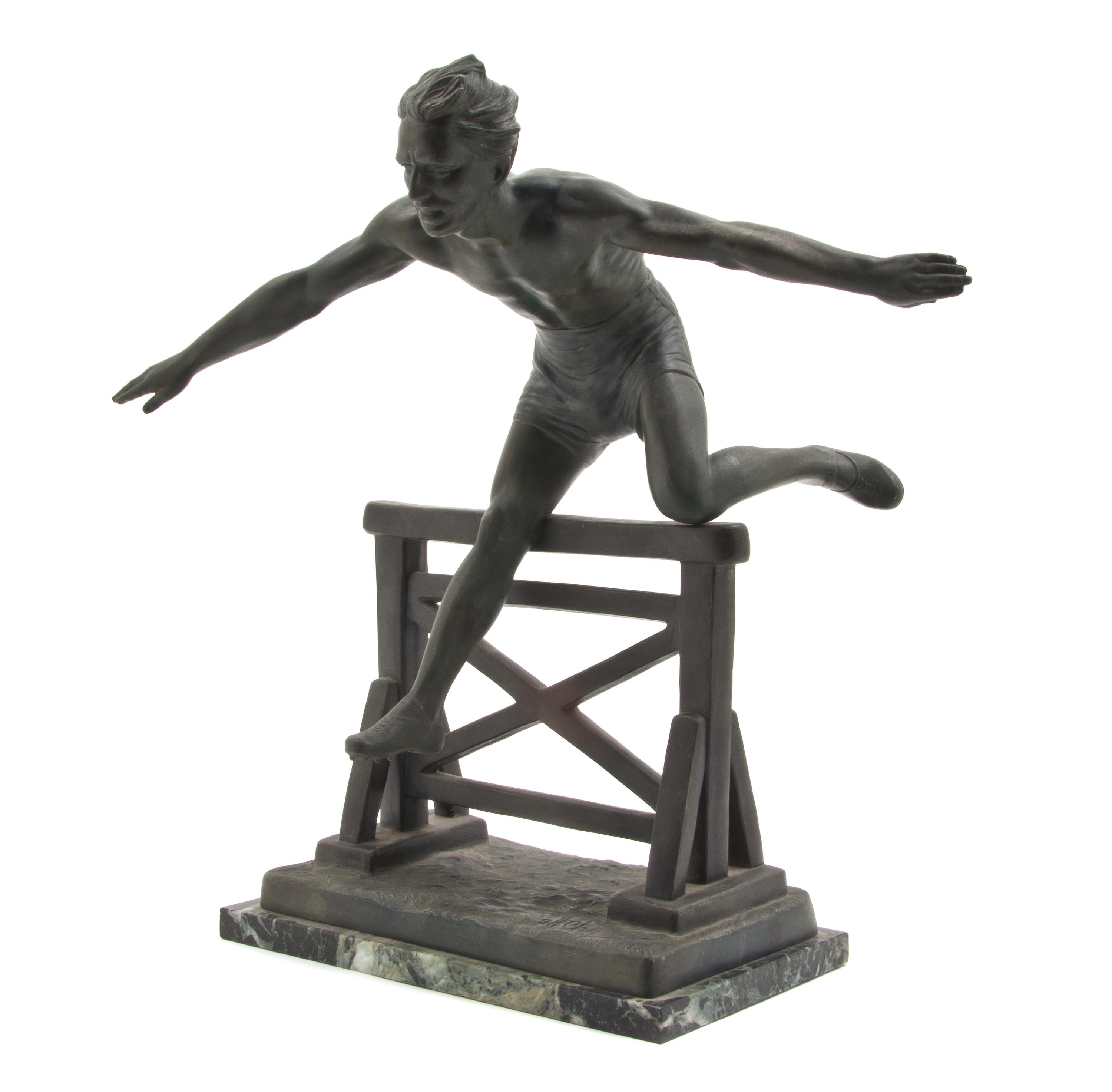 A French Cast Metal Figure of a Hurdler, after Chiparus, Height 17 3/4 inches.
