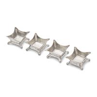 A Set of Four Aesthetic Movement Hammered Sterling Silver Salt Cellars