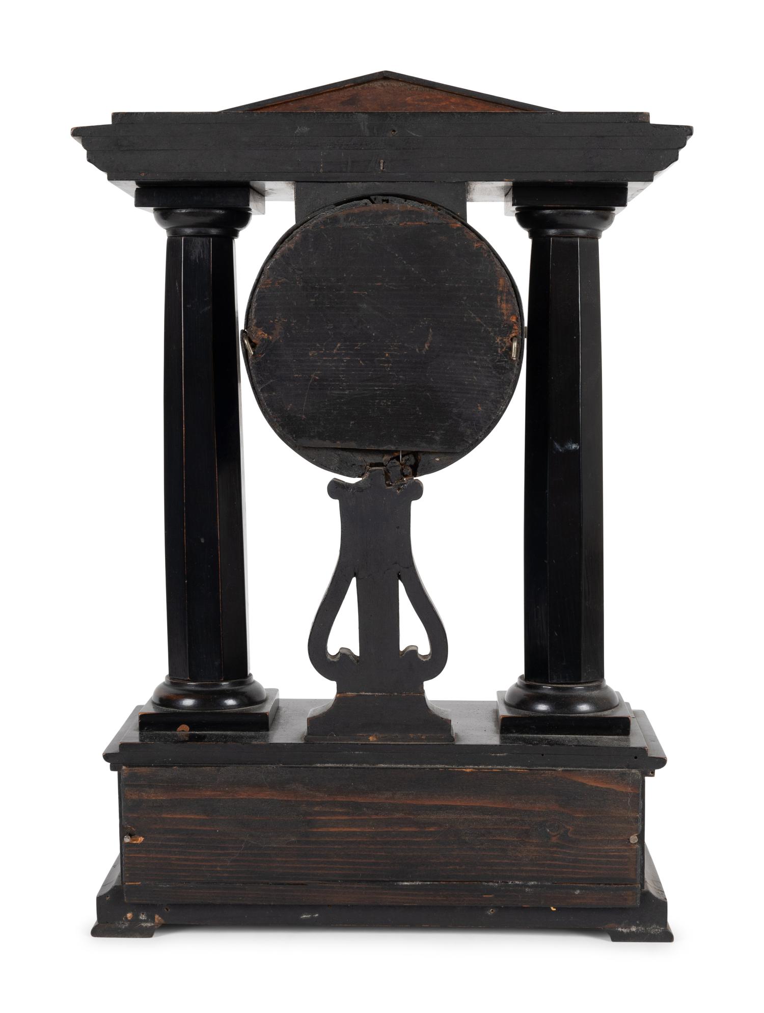A German Ebonized Cherrywood and Gilt Bronze Mounted Architectural Mantel Clock
