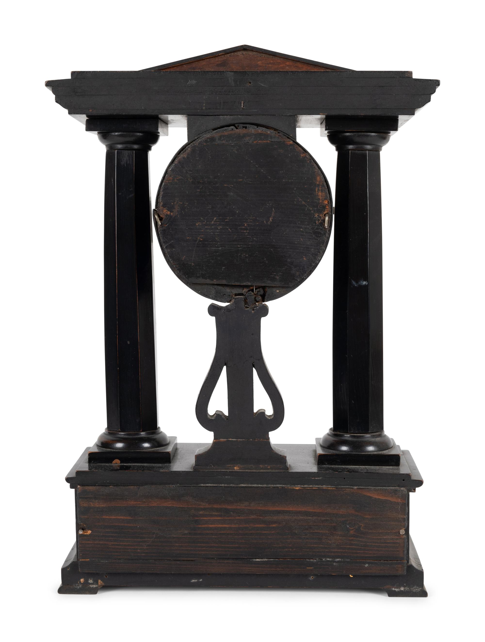 A German Ebonized Cherrywood and Gilt Bronze Mounted Architectural Mantel Clock