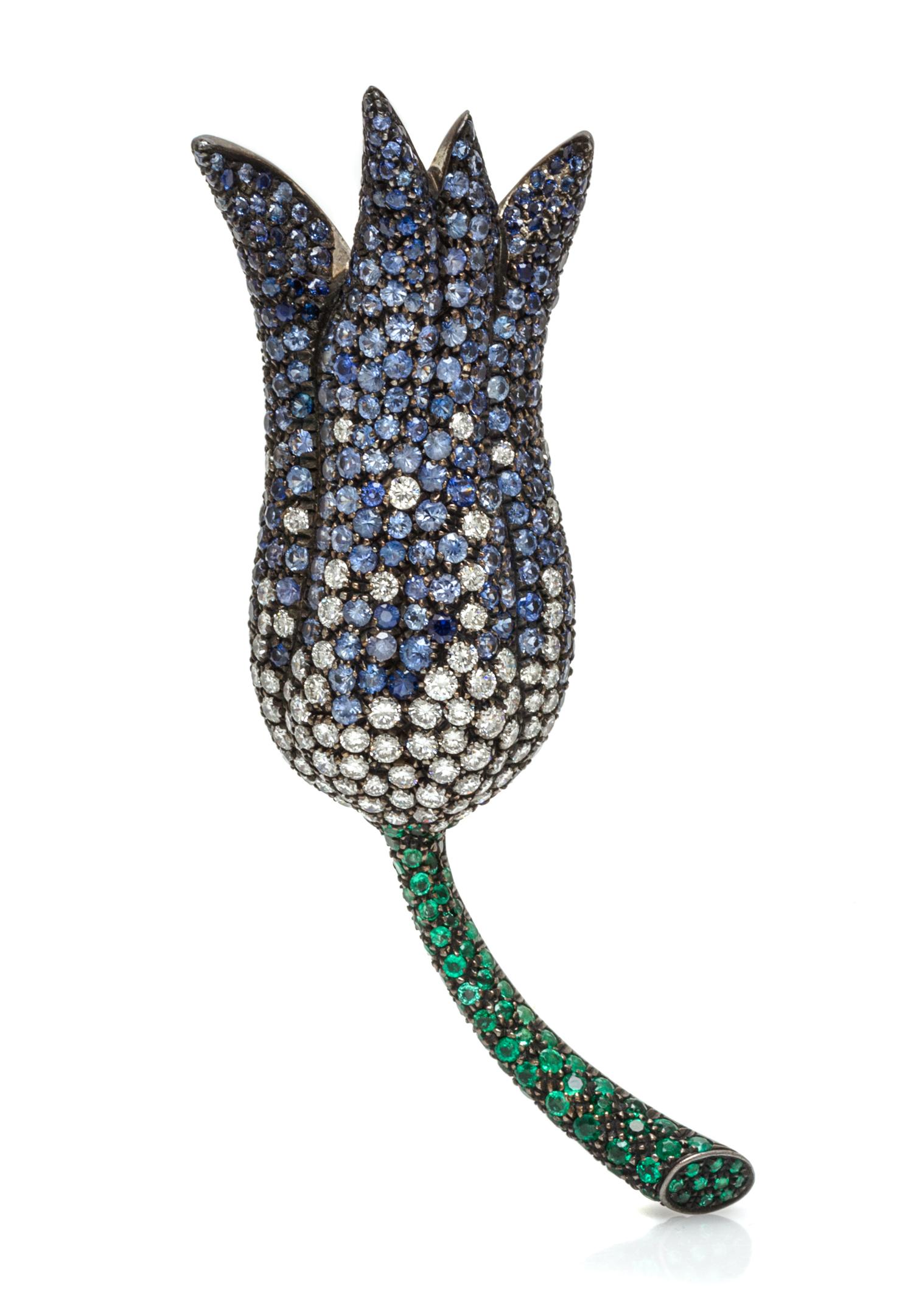 An 18 Karat Gold, Diamond, Sapphire and Tsavorite Garnet Brooch, 19.00 dwts.