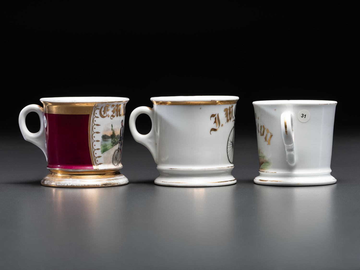 Three Cyclist's Porcelain Shaving Mugs