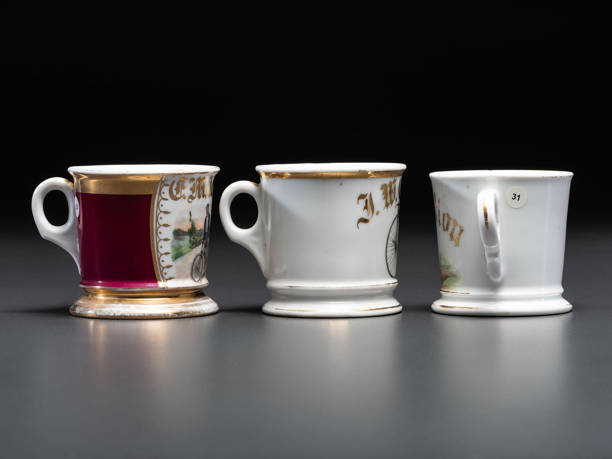 Three Cyclist's Porcelain Shaving Mugs