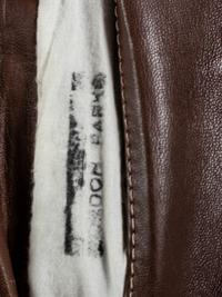 [FILM] -- [PARKS, Gordon (1912-2006)]. Leather overcoat identified to Gordon Parks.