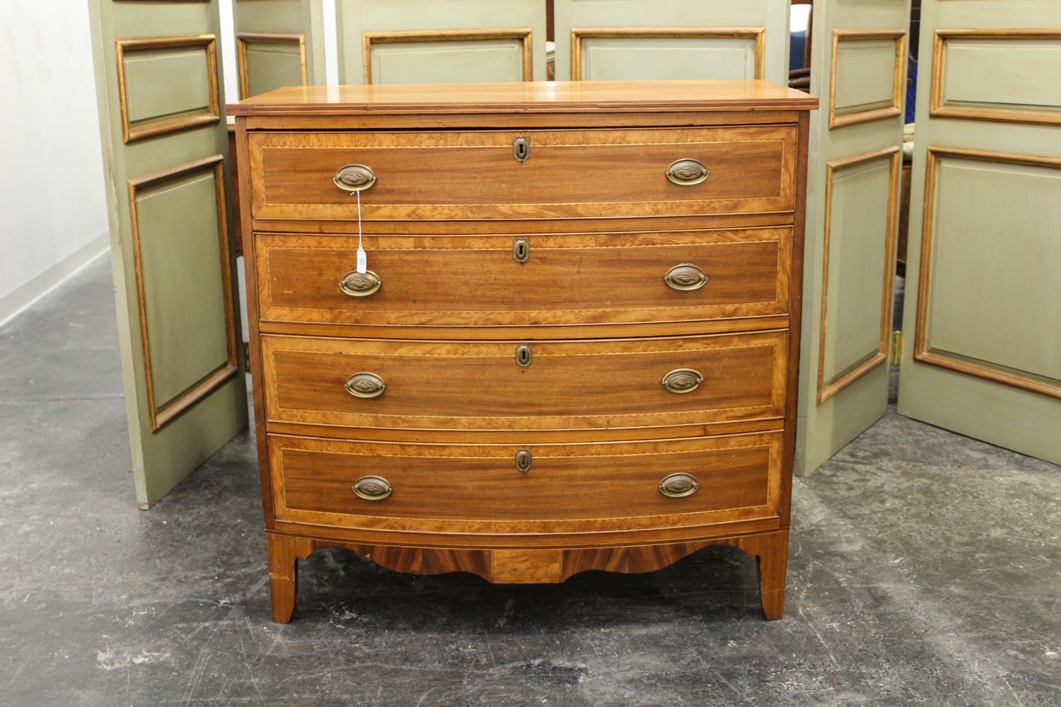 An American Mahogany Chest of Drawers Height 38 1/4 x width 39 1/2 x depth 21 3/4 inches. — 19TH/20TH CENTURY