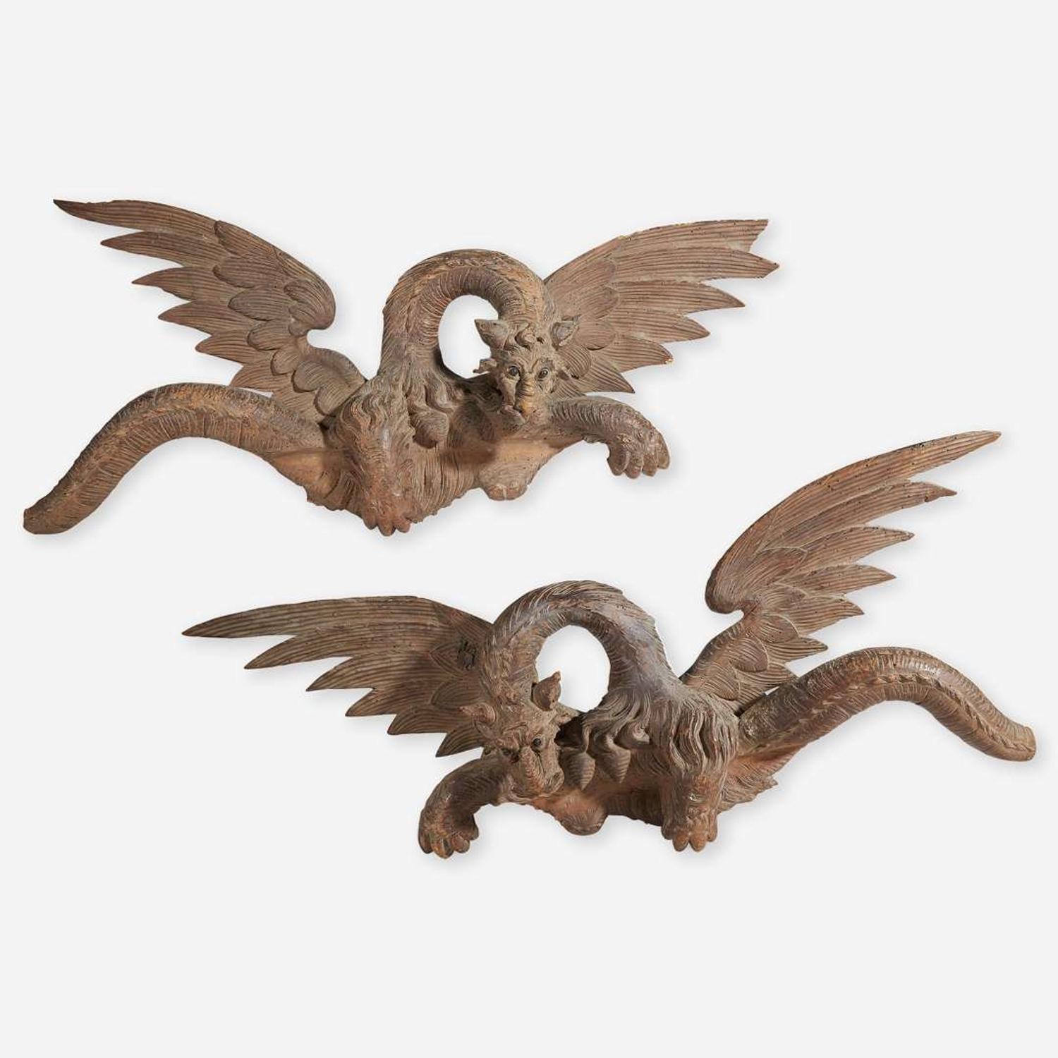 A pair of Italian carved walnut Chimera Probably Florentine, 18th / 19th century