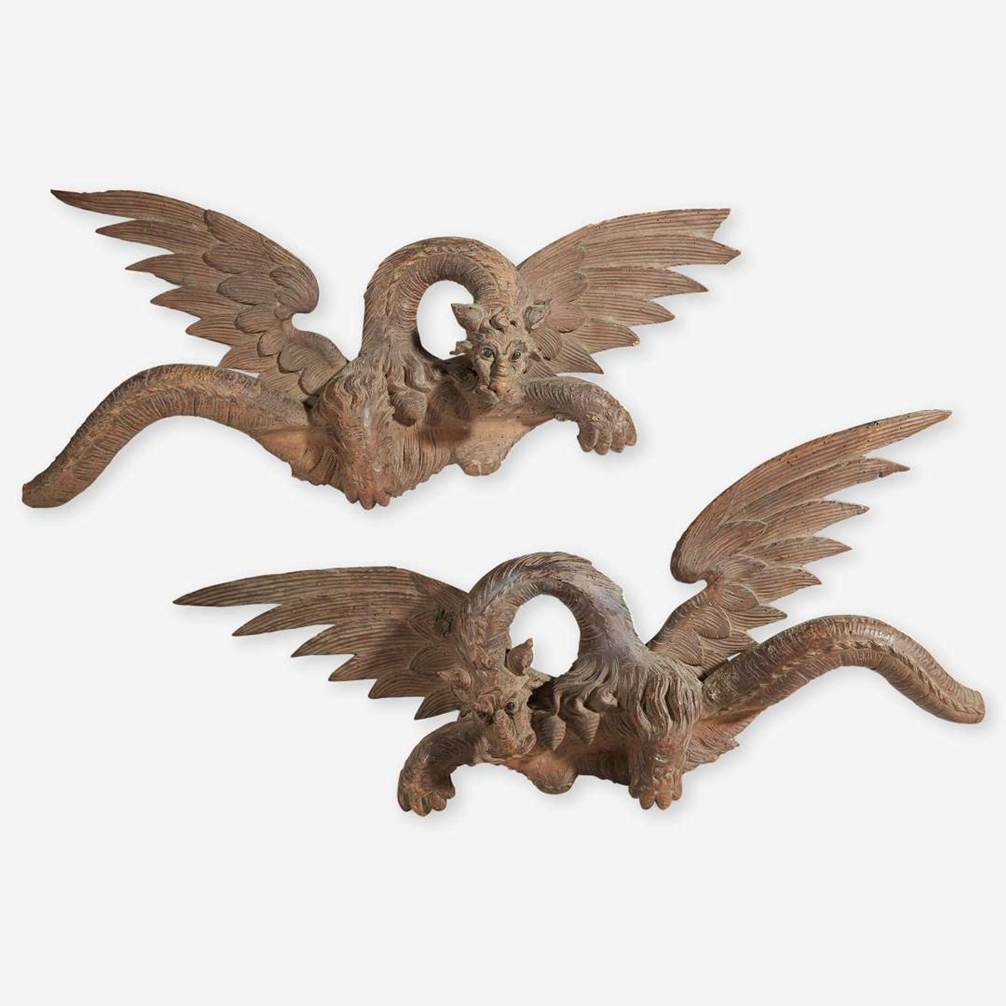 A pair of Italian carved walnut Chimera Probably Florentine, 18th / 19th century