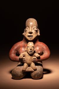 A Jalisco Kneeling Female Figure with Infant