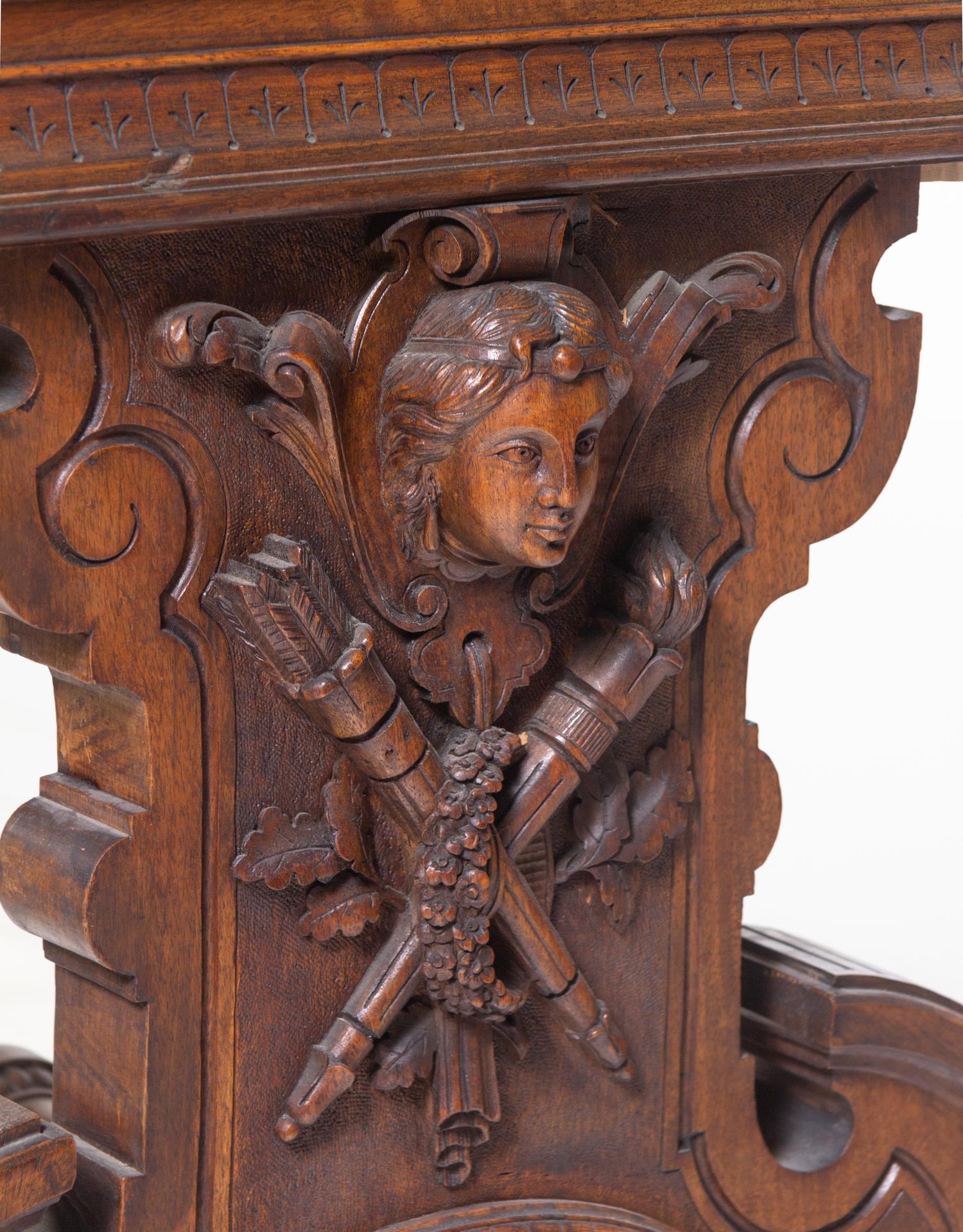 A Swiss Cylinder Music Box in a Carved Walnut Case and Stand