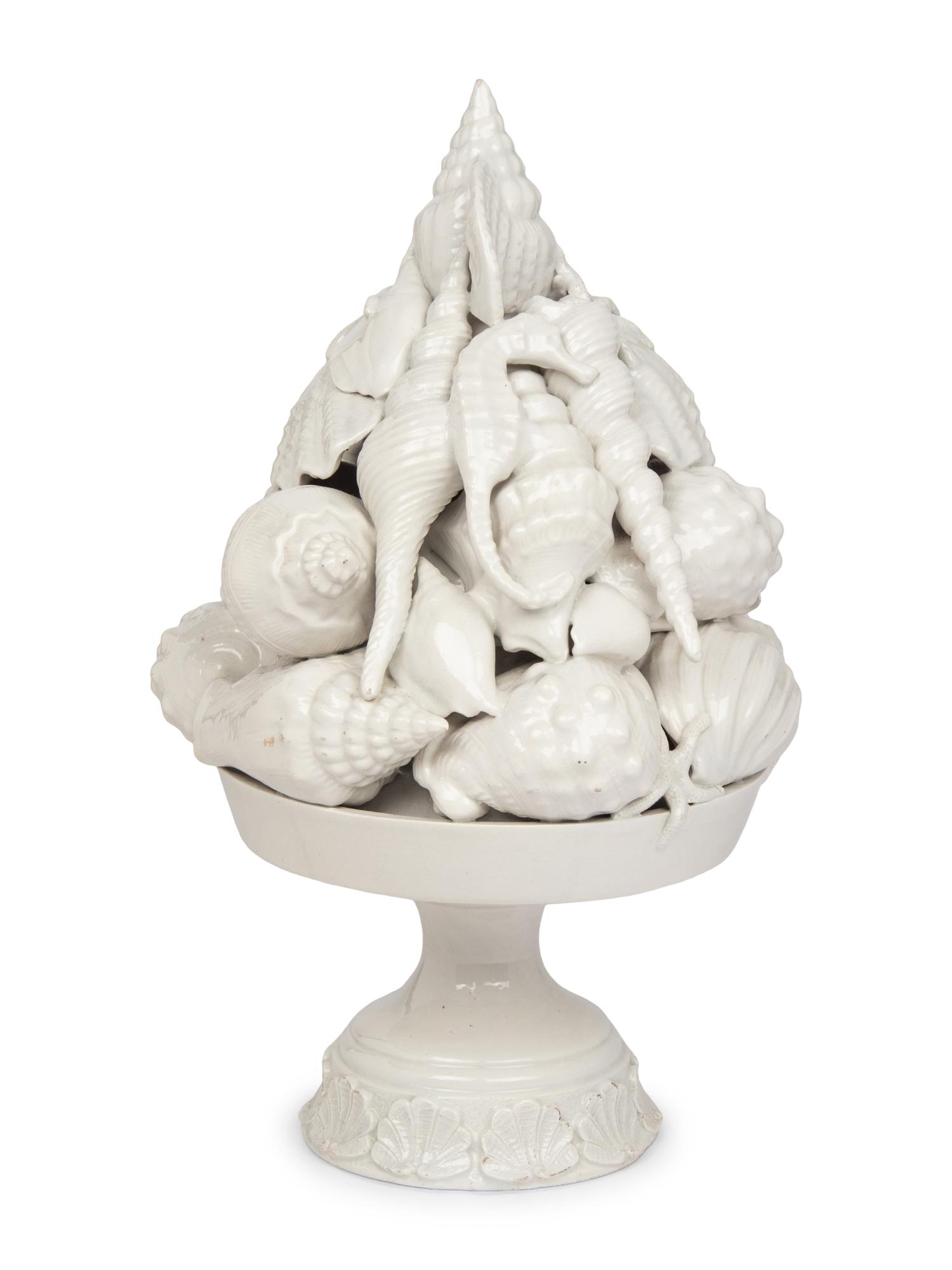 An Italian White Glazed Earthenware Centerpiece