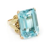 A Bicolor Gold and Blue Topaz Ring,