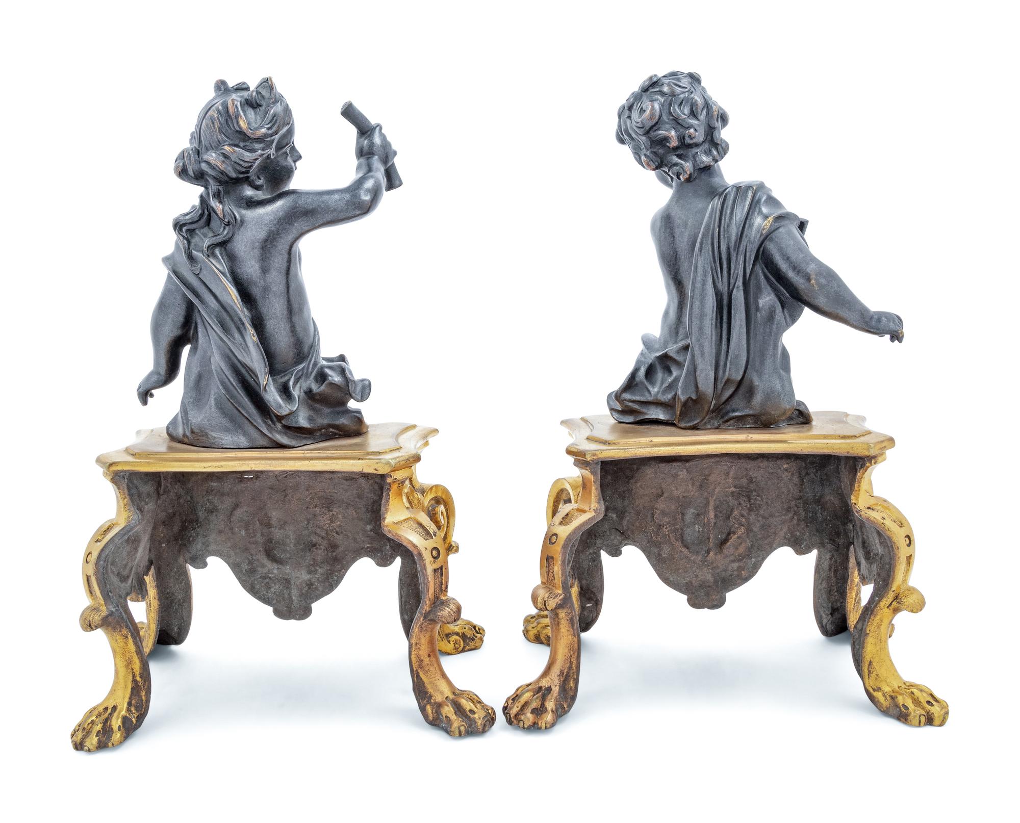 A Pair of French Gilt and Patinated Bronze Figural Chenets