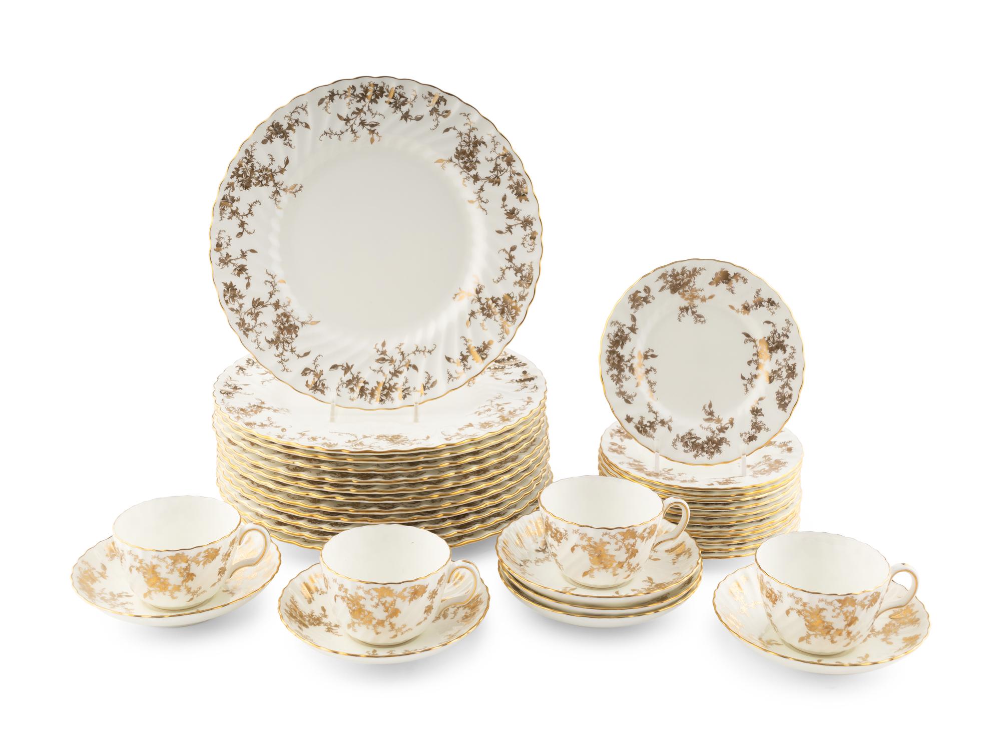 A Mintons Porcelain Dinner Service