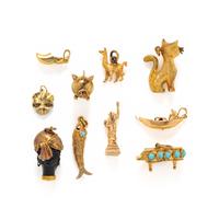COLLECTION OF YELLOW GOLD CHARMS