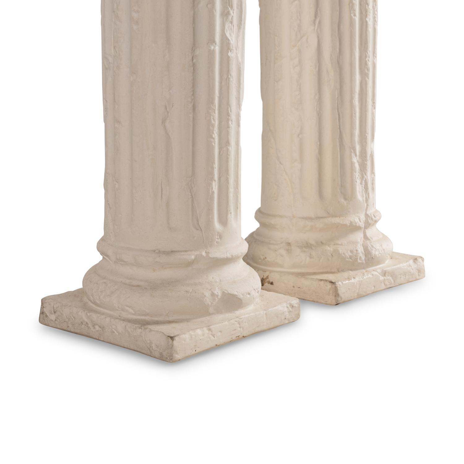A Pair of White Plaster Fluted Columnar Pedestals