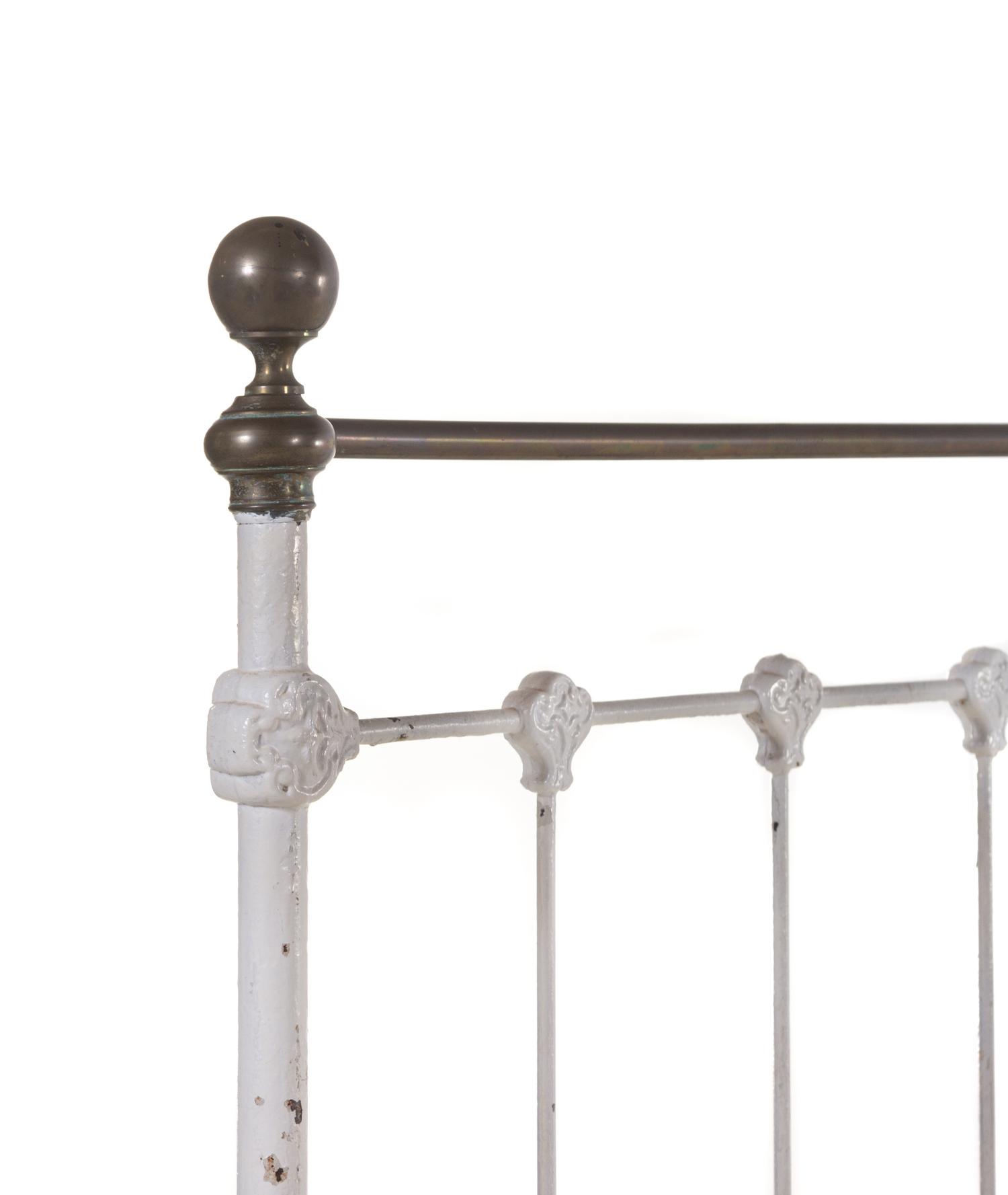 A Pair of Painted Iron Beds