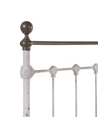A Pair of Painted Iron Beds