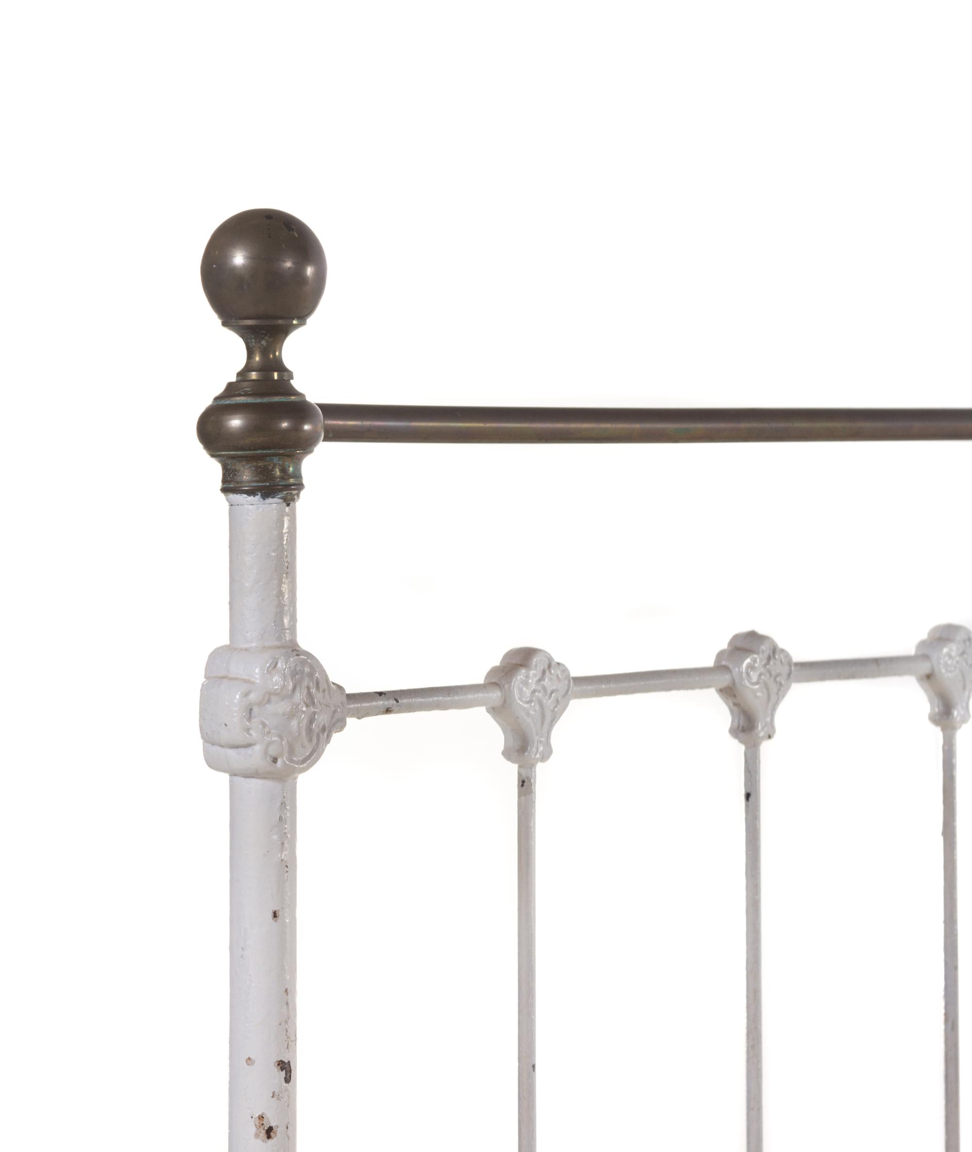 A Pair of Painted Iron Beds