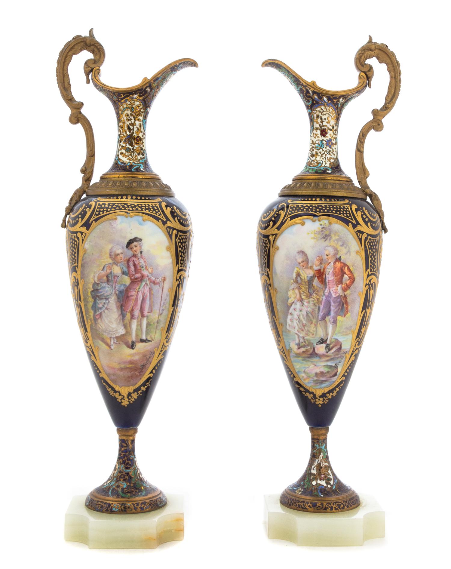 A Pair of Gilt Metal Mounted and Champleve Sevres Style Porcelain Ewers Height 16 1/2 inches. — LATE 19TH CENTURY