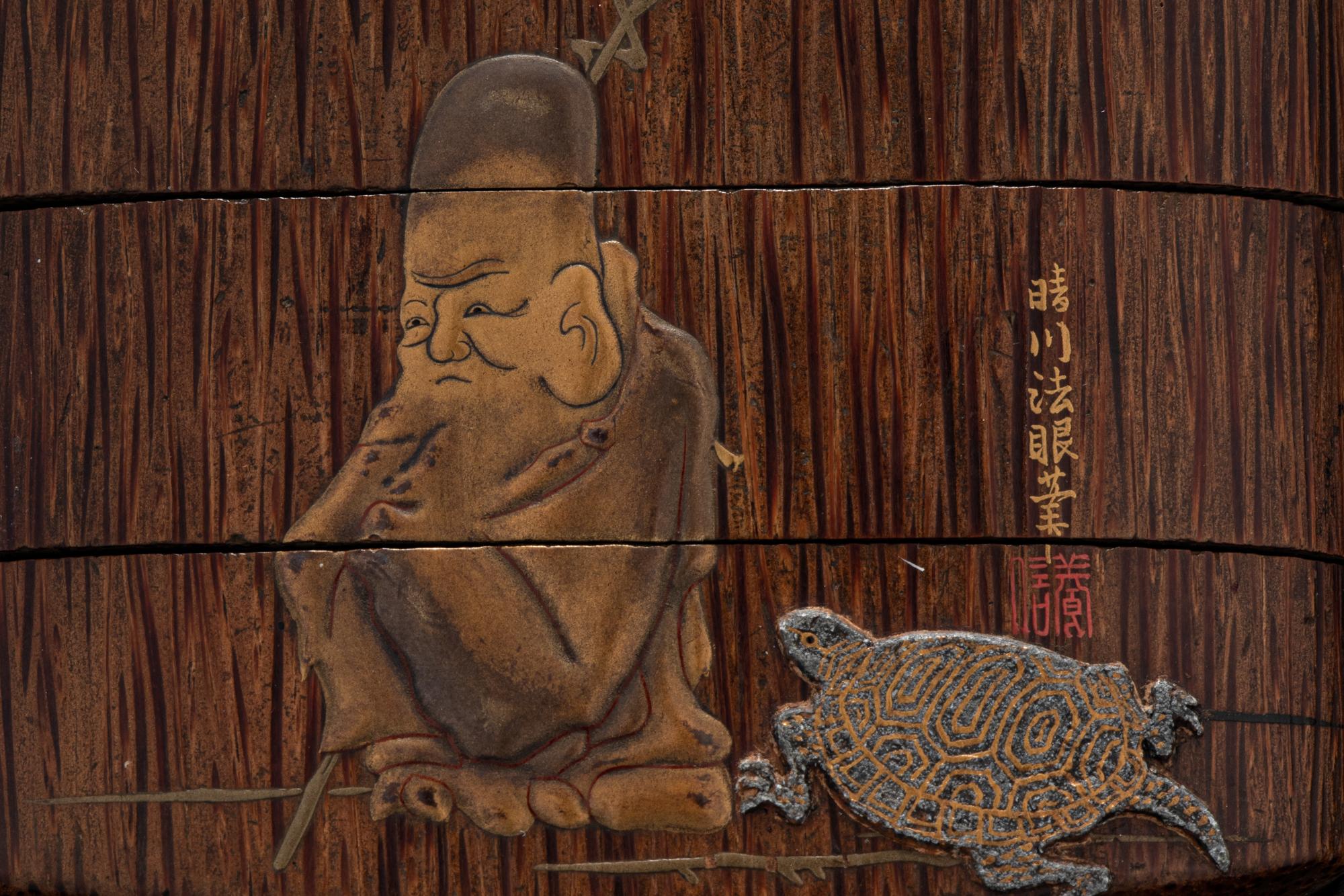 A Japanese Gold and Brown Lacquered Wood Two-Case Inro