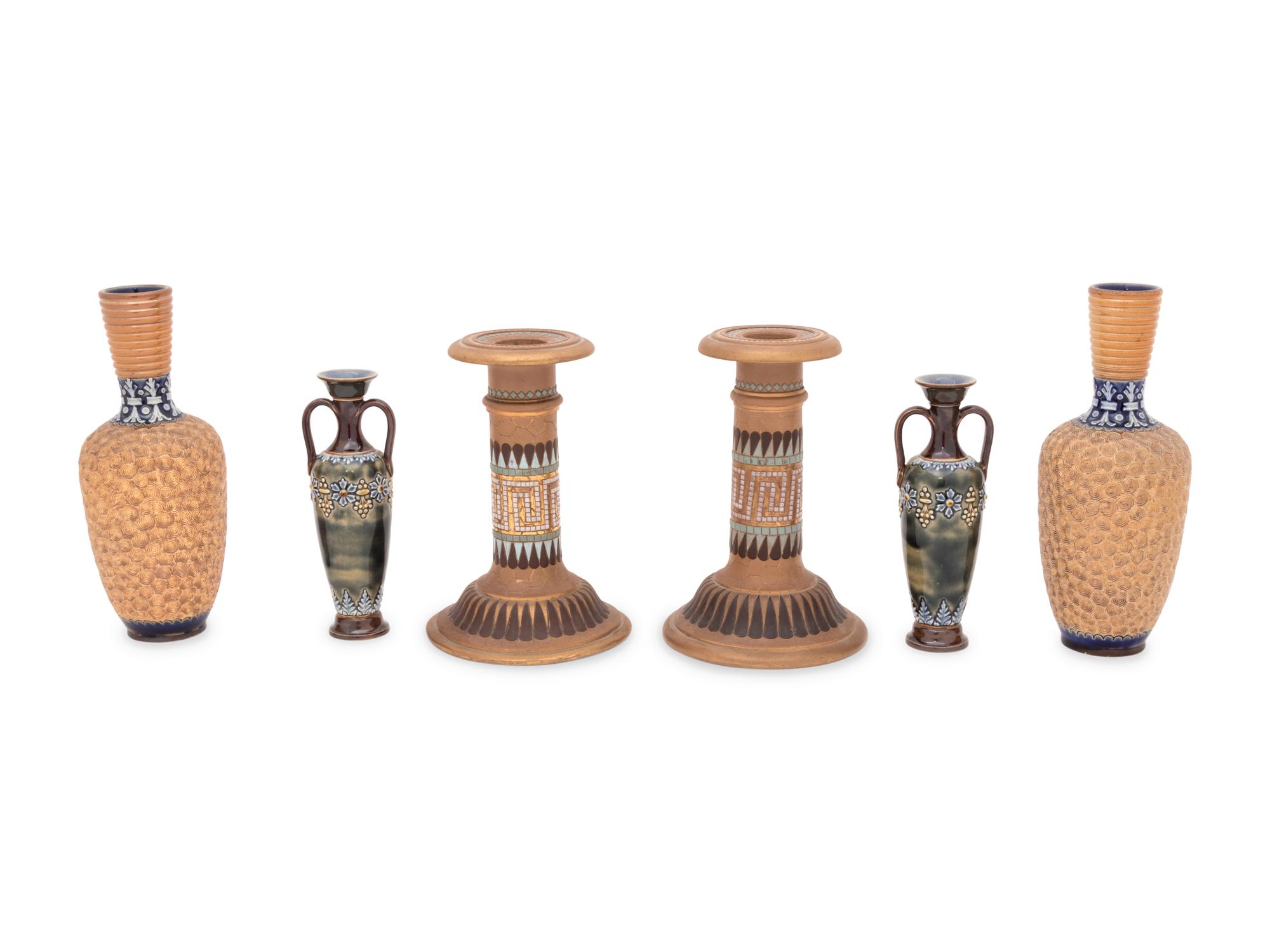 A Group of Doulton Lambeth Stoneware Vases and a Pair of Candlesticks